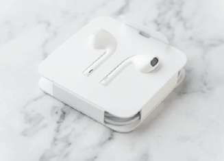 Securing headphone cables with bundling